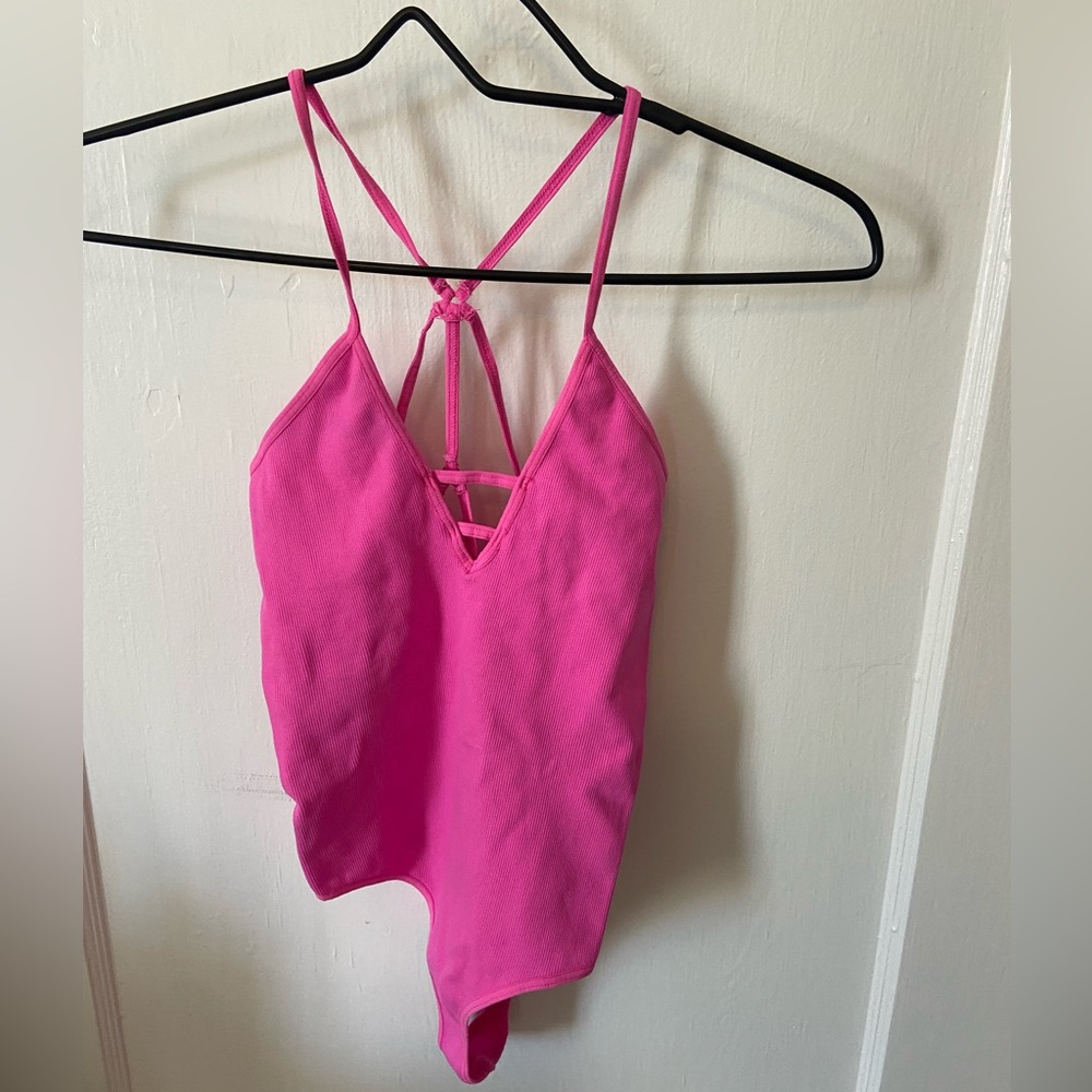 Pink body suit